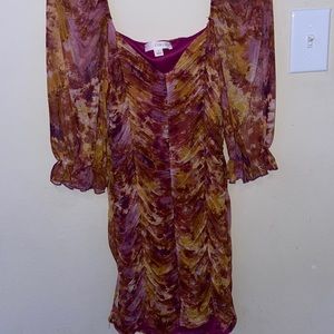 Sherbet colored dress with puffy see thru sleeves